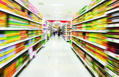 Empty supermarket aisle,motion blur