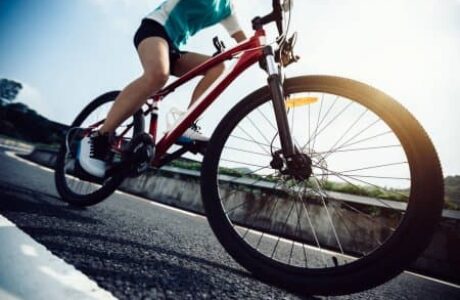 depositphotos_215914328-stock-photo-woman-cyclist-riding-mountain-bike (1)